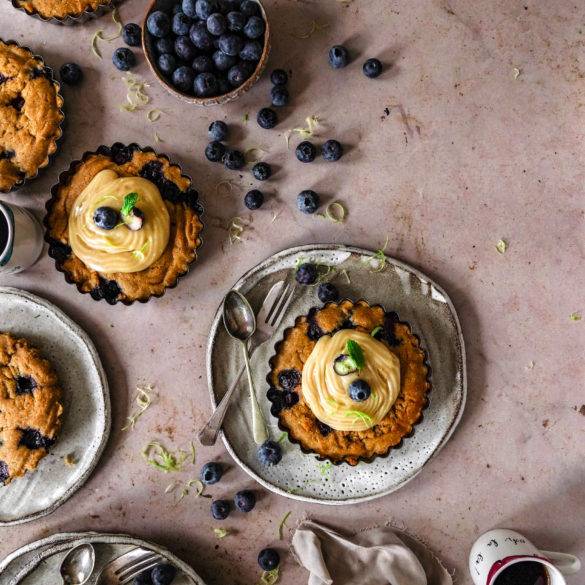 Spongy moist burst Vegan gluten-free Peanut Butter Blueberry Cake recipe; infused with citrus lemon and vanilla in a millet and rice confectionary. Edward Daniel ©.