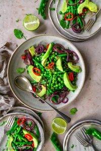 Buttery avocado, sweet succulent peas, crisp fine beans, fiery chilli and citrus lime infused with fresh mint; vegan Avocado Fine Bean Salad recipe, paleo too. Edward Daniel ©.