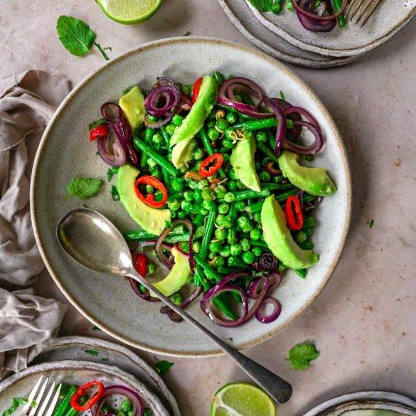 Buttery avocado, sweet succulent peas, crisp fine beans, fiery chilli and citrus lime infused with fresh mint; vegan Avocado Fine Bean Salad recipe, paleo too. Edward Daniel ©.