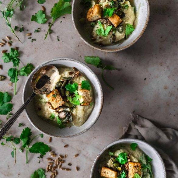 Vegan Roasted Parsnip and Celeriac Soup recipe, paleo too; with earthy caraway, marjoram, thyme and coriander and topped with toasted sunflower and pumpkin seeds; Edward Daniel ©.