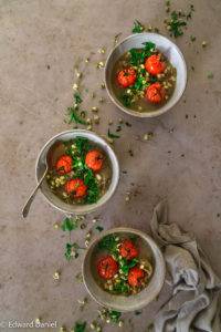 Luxurious Vegan Sprouted Mung Bean Soup recipe; cooked in a mushroom flavoured stock, polished with sweet cherry tomatoes and lashings of fresh parsley, Edward Daniel ©.