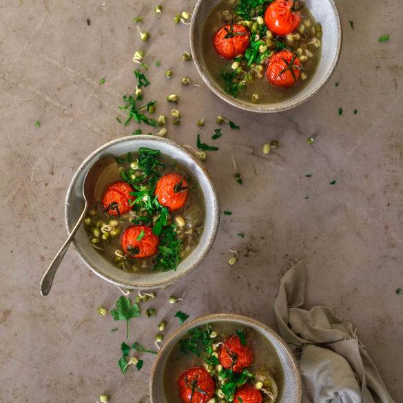 Luxurious Vegan Sprouted Mung Bean Soup recipe; cooked in a mushroom flavoured stock, polished with sweet cherry tomatoes and lashings of fresh parsley, Edward Daniel ©.