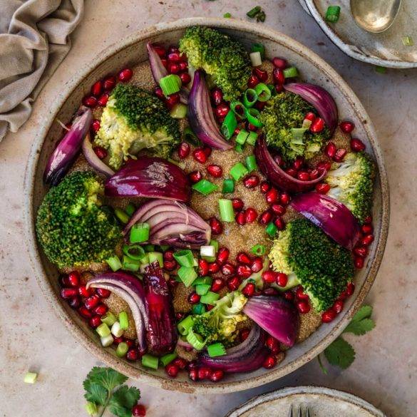 Malty vegan gluten-free Pomegranate Broccoli Amaranth Salad recipe; with pungent red onion, mellow spring onions and tangy pomegranate. Edward Daniel ©.