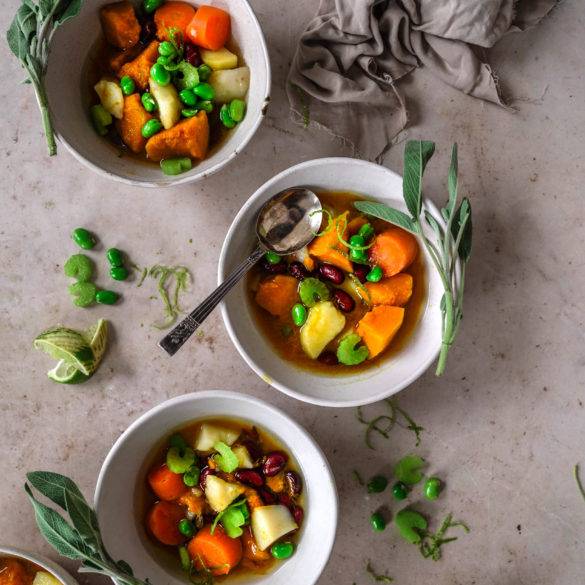 Vegan Sage Pumpkin Pottage recipe; with broad and kidney beans, potatoes, celery, carrots, lemon grass, and lime. Edward Daniel ©.