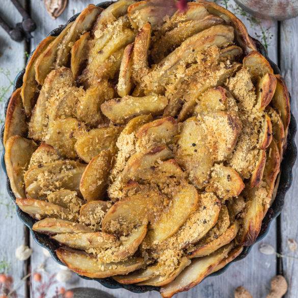 A walnut/peanut filling with lemony-peppery thyme in a sundried tomato and onion gravy overload with cheesy potato slices; Cottage Pie.