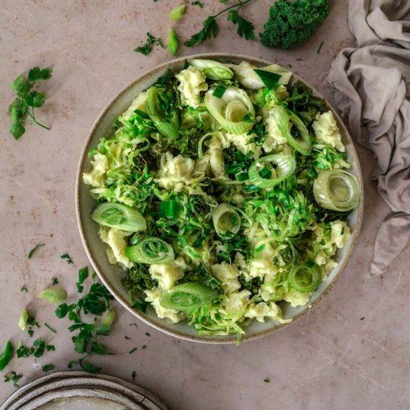 Fluffy smashed potatoes infused with lashings of shredded sautéed cabbage, steamed kale and scallions; Vegan gluten-free Colcannon recipe, Irish cuisine. Edward Daniel ©.