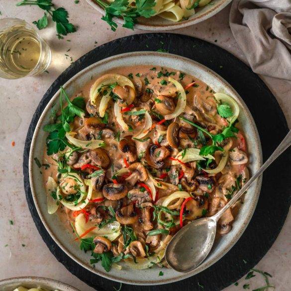 Mushrooms cooked in white wine and almond cream flavoured with smoked paprika, umami tamari and wholegrain mustard; vegan gluten-free Mushroom Stroganoff recipe. Edward Daniel ©.