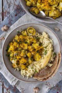 Fluffy pillowy Bombay Potatoes parboiled and sauteed with bitter mustard seeds, lemony coriander seeds and musky turmeric.