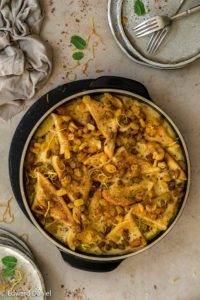 Crisp buttered bread drenched in a creamy coconut almond saffron custard with cinnamon and nutmeg; vegan Bread and Butter Pudding recipe. Edward Daniel ©.