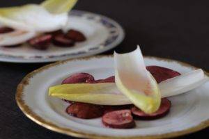 Caption of Raw Citrus-marinated chicory with Cabernet-soaked chestnut mushrooms. Image by Edward Daniel (c).