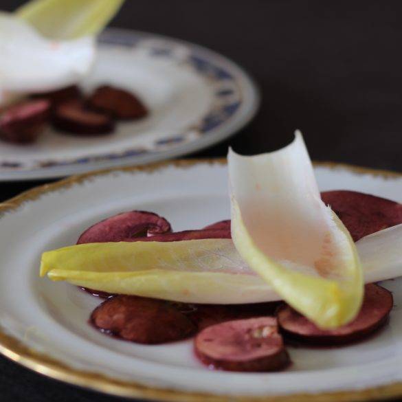 Caption of Raw Citrus-marinated chicory with Cabernet-soaked chestnut mushrooms. Image by Edward Daniel (c).