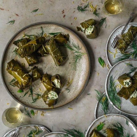 Fragrant dill and mint herbed rice made in wine, garlic and lemon, wrapped in brined vine leaves; vegan Dolmades recipe. Edward Daniel ©.