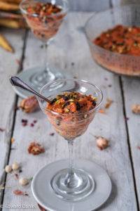 Grated carrots dehydrated in an almond date cream littered with sundried raisins and sprinkled with chopped pistachios; Carrot Halva.