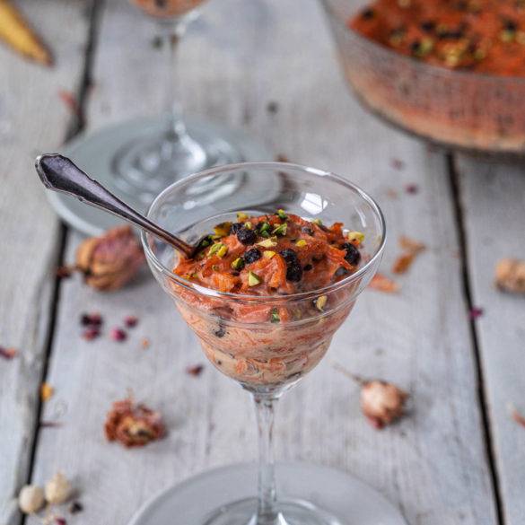 Grated carrots dehydrated in an almond date cream littered with sundried raisins and sprinkled with chopped pistachios; Carrot Halva.