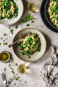 Sun-kissed legumes scattered over creamy risotto cooked in white wine, olive oil and chopped garlic cloves; vegan Broad Bean and Pea Risotto, paleo too. Edward Daniel ©.