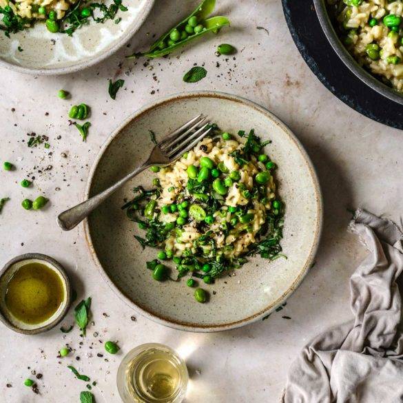 Sun-kissed legumes scattered over creamy risotto cooked in white wine, olive oil and chopped garlic cloves; vegan Broad Bean and Pea Risotto, paleo too. Edward Daniel ©.