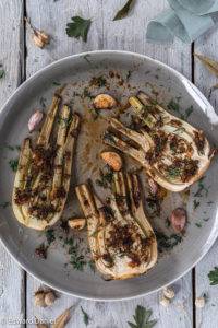 Anise-like fennel roasted with a garlic and ginger lime sauce garnished with liquorice-like dill; Roasted Fennel with Dill and Ginger.