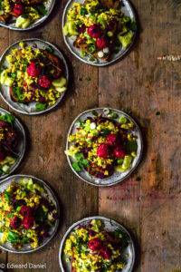 Earthy ginger-like turmeric Tofu Scramble with bulbous piercing spring onions and roasted succulent tart tomatoes. Edward Daniel ©.