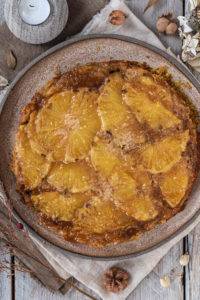 Moist caramel-soaked tropical Pineapple Upside Down Cake scented with rose water and licorice-like Star Anise.