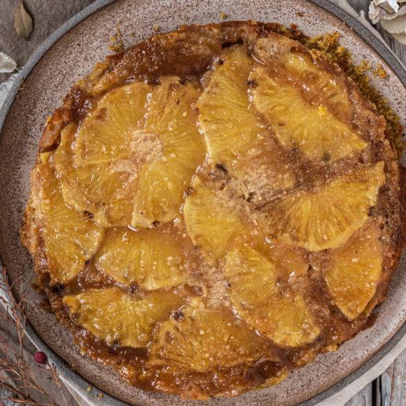 Moist caramel-soaked tropical Pineapple Upside Down Cake scented with rose water and licorice-like Star Anise.