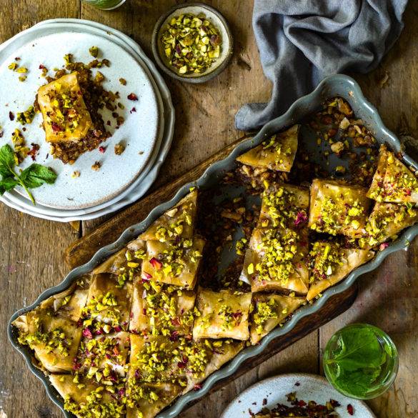 Almonds and Walnut caramelised between pastry sheets with earthy cinnamon, cloves and nutmeg, and topped with crushed pistachios; Vegan Baklava recipe, Turkish cuisine. Edward Daniel ©.