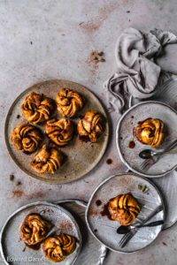 Twirled sorghum rice leavened pastry with fragrant smoky cardamon, earthy cinnamon and caramelised coconut; Vegan gluten-free Cinnamon Buns recipe. Edward Daniel ©.