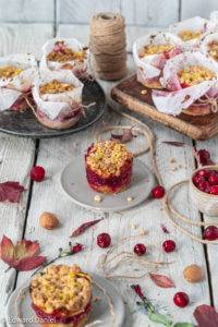 Burst cranberry with sour apples on a biscuit bed and crumble topping, with hints of lemon seeping through; Cranberry and Apple Streusel.