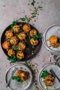 Crispy raw vegan Butternut Squash Latkes, paleo too, Jewish cuisine, with smoked paprika, parsley, garlic and bound in sesame flaxseed crust. Edward Daniel ©.