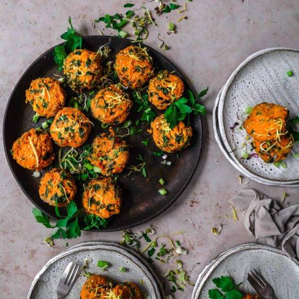 Crispy raw vegan Butternut Squash Latkes, paleo too, Jewish cuisine, with smoked paprika, parsley, garlic and bound in sesame flaxseed crust. Edward Daniel ©.