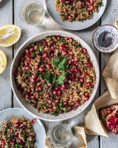 Caption of Coriander Pomegranate Quinoa Salad Flatlay. Image by Edward Daniel (c).