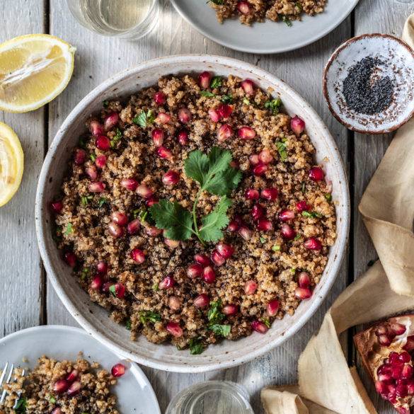 Caption of Coriander Pomegranate Quinoa Salad Flatlay. Image by Edward Daniel (c).