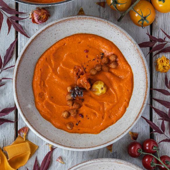 Creamy charred Roasted Pepper and Tomato Soup flavoured with oregano and harissa thickened with lentil pearls.