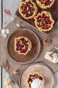 Citrus Cranberry Mince Pies made with lemon and orange peel, cinnamon, allspice, mace and nutmeg with a chickpea tapioca pastry.
