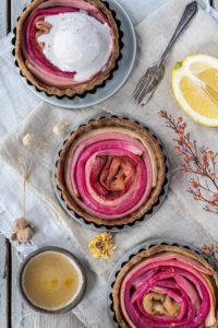 Juicy rich puckery tangy sour Rhubarb Tart laced with citrus sugar in an amaranth oat flaxseed shortcrust pastry.