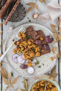 Cauliflower with kalamata olives marinaded in molasses, cider vinegar, turmeric and mustard seeds; Cauliflower Tartare.