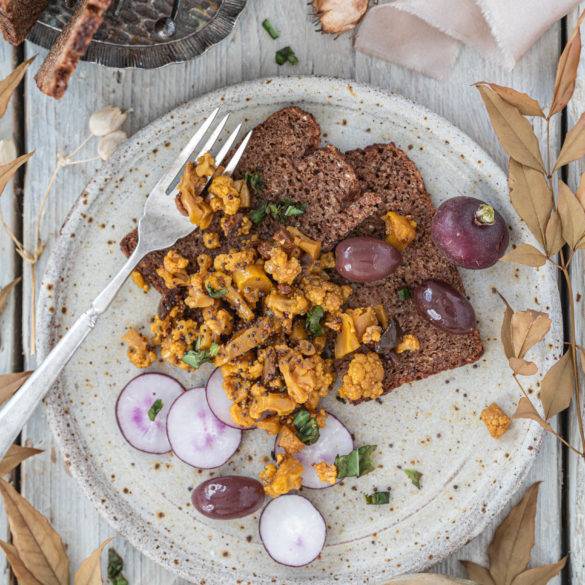 Cauliflower with kalamata olives marinaded in molasses, cider vinegar, turmeric and mustard seeds; Cauliflower Tartare.