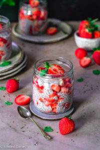 Taste sensational berry sharp strawberries tucked between layers of spongy coconut milk; raw vegan Strawberry Chia Seed Pudding recipe. Edward Daniel ©.