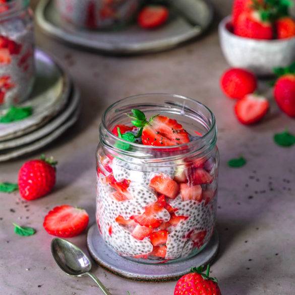 Taste sensational berry sharp strawberries tucked between layers of spongy coconut milk; raw vegan Strawberry Chia Seed Pudding recipe. Edward Daniel ©.