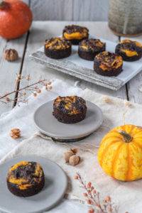 Fudgy nutty Pumpkin Brownies enriched with pumpkin flesh, ground almonds, coconut flakes and cacao powder.