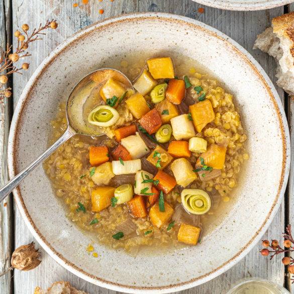 Earthy root swede, carrots, celery and leeks slowly simmered with lentils to produce a sweet soup; Vegan Welsh Cawl.