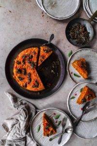 Savoury sponge vegan gluten-free Dhokla cake recipe; with ginger, turmeric, chili, lemon topped with mustard, cumin, asafoetida and curry tadka. Edward Daniel ©.