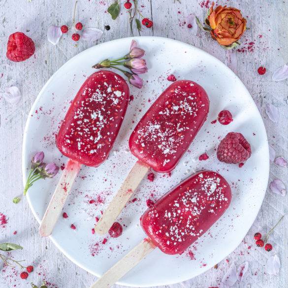Sweet tart tropical Raspberry Popsicle with a dash of lime and a pinch of salt to draw out a fuller intense flavour of the raspberries.