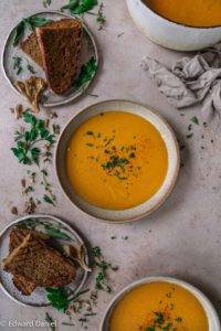 Smooth sensuous velvety gluten-free Vegan Lobster Bisque Soup recipe; seasoned with candied citrusy cognac and a couple of delicate sweet shallots and ballistic garlic cloves. Edward Daniel ©.