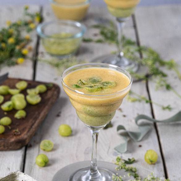 Gooseberries with sweet fragrant nutmeg swimming in honey-like saffron and rose water yoghurt; Raw Gooseberry Compote with Saffron Yoghurt.