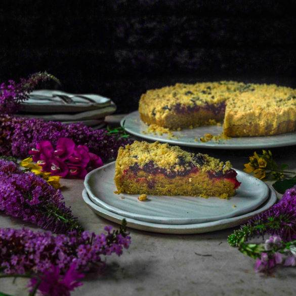 Layers of sponge base, scattered with tangy blackcurrants topped with a crisp crumble give; Blackcurrant Buckle. Edward Daniel ©.