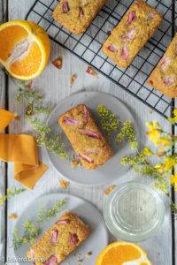 Citrusy orange nicely balanced with tangy hints of rhubarb spatially littered across this moist gluten-free Rhubarb and Orange Cake.