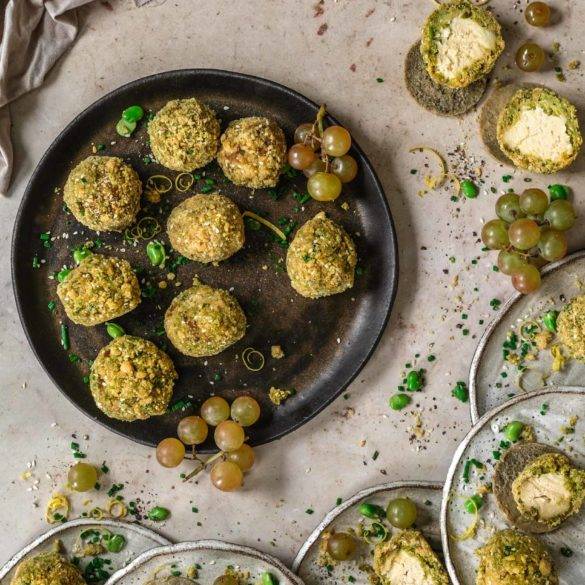 Velvety almond cheese wrapped in creamy buttery broad beans and earthy celery coated in crispy nutty sesame and flaxseed; raw gluten-free Vegan Cheese Arancini, paleo too, Italian cuisine. Edward Daniel ©.