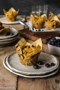 Burst succulent Blueberries in a millet almond Muffins with a hint of earthy woody cinnamon; Blueberry Muffins. Edward Daniel ©.