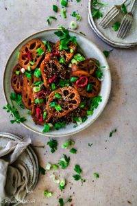 Vegan Braised Lotus Root recipe, Korean cuisine, paleo too; with soy, rice mirin wine, maple syrup, chilli, sesame seed and sprinkled spring onion. Edward Daniel ©.