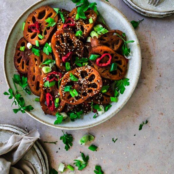 Vegan Braised Lotus Root recipe, Korean cuisine, paleo too; with soy, rice mirin wine, maple syrup, chilli, sesame seed and sprinkled spring onion. Edward Daniel ©.